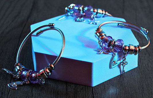 White matte bead bracelet with silver lotus charm