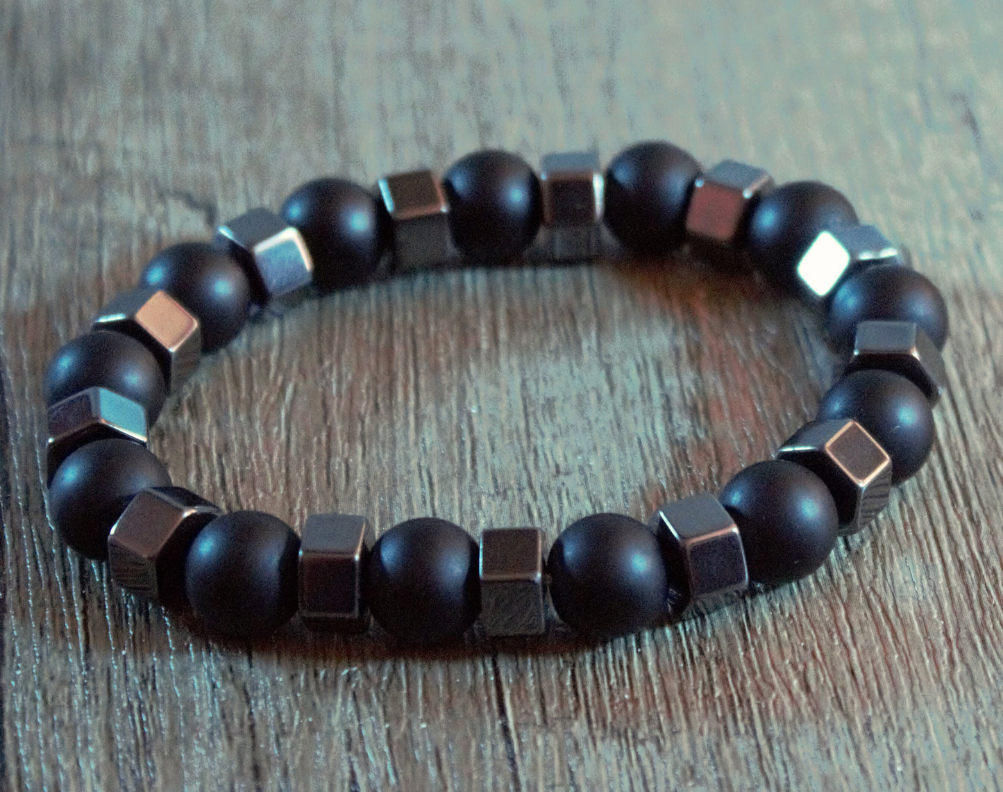 Simple black cord with adjustable clasp and single silver detail bead